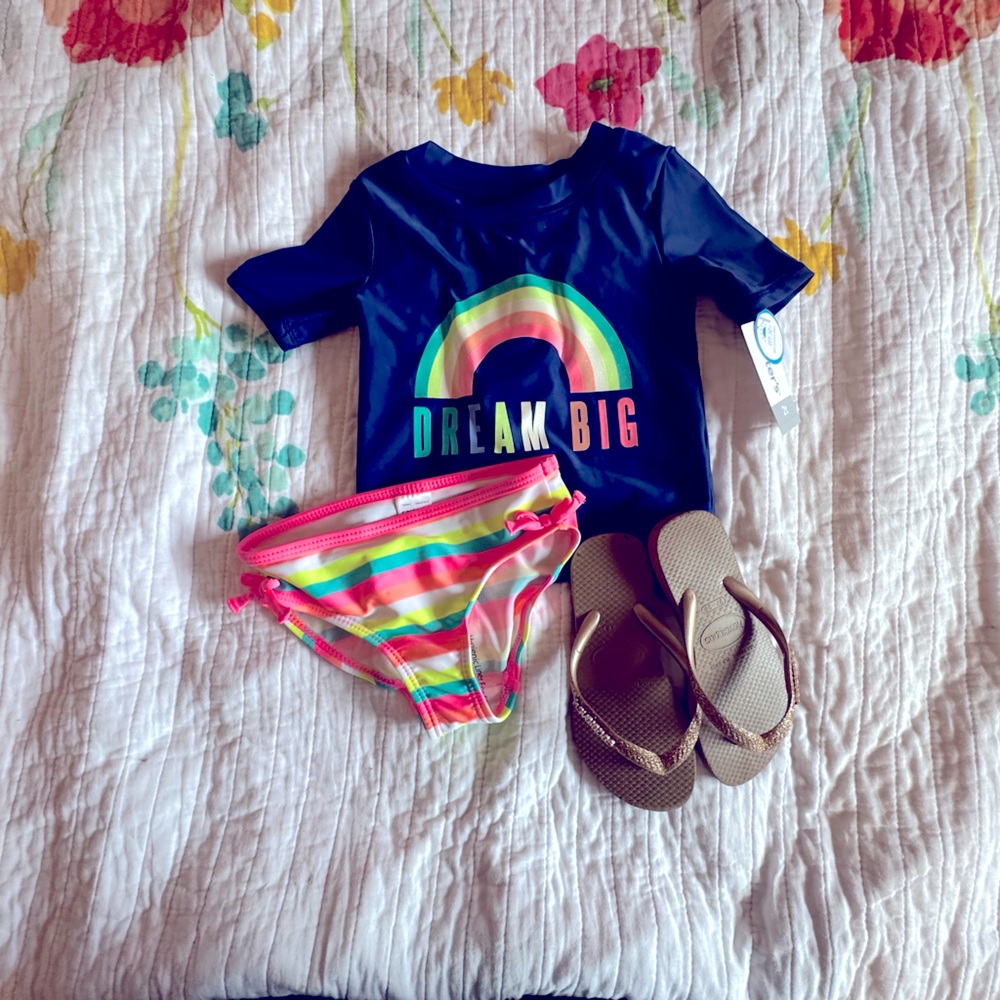 Carter’s bathing suit and Havaianas flip flops